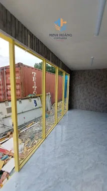 Container Nhà Ở 20 Feet Xanh Lá Viền Vàng Khung Kính Ốp Gỗ